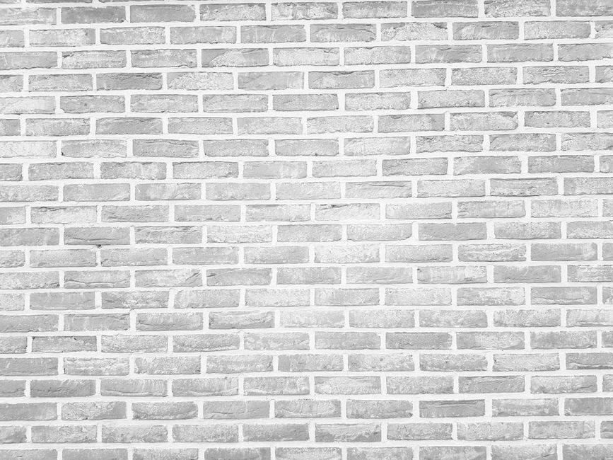 Close-up van fotobehang met baksteenpatroon.